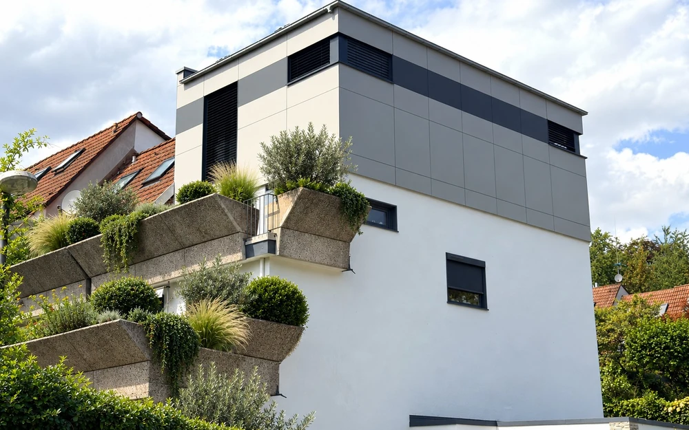 AUFSTOCKUNG WOHNHAUS